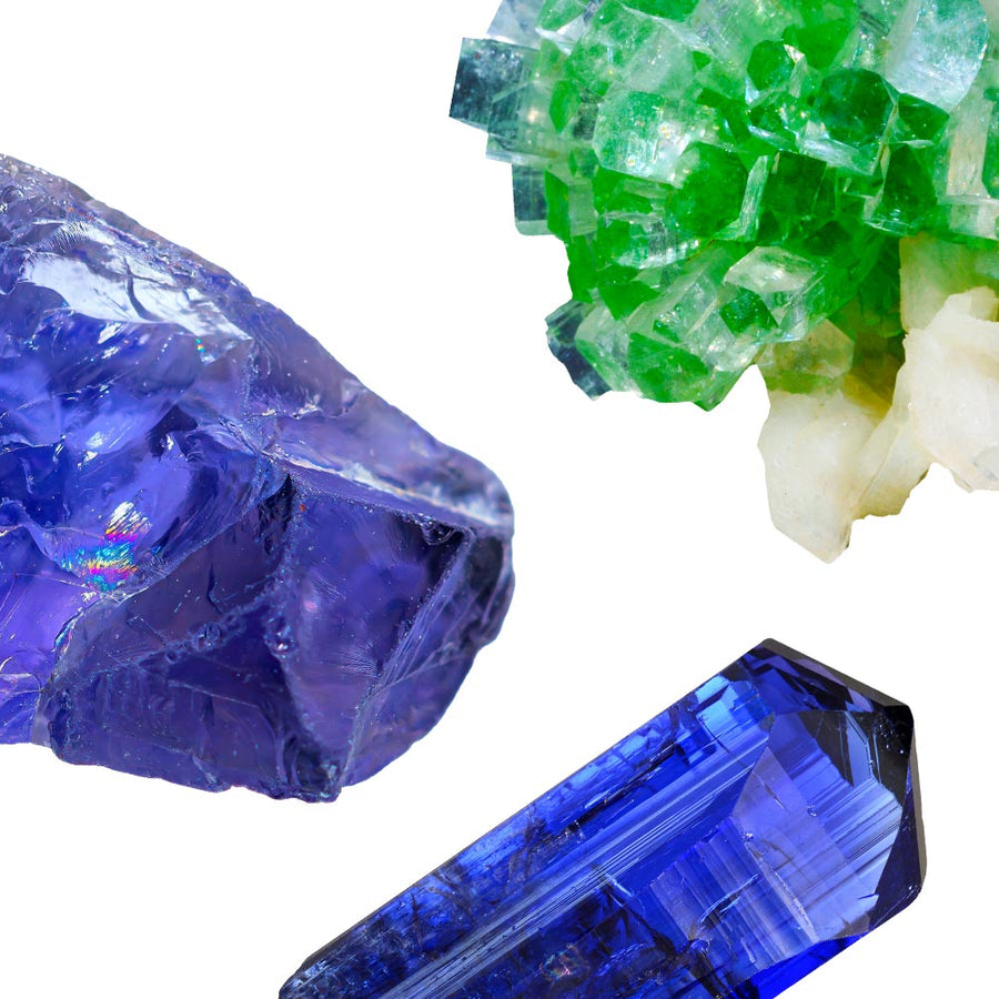 Assortments of precious gemstones in vibrant blue and green colours against a white background, used in Anami Alchemia Crystal Elixirs. 